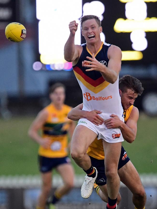 Adelaide's Alex Keath gets a handpass away on Saturday. Picture: Tom Huntley