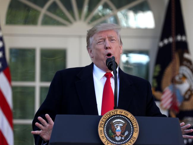 (FILES) In this file photo taken on January 25, 2019 US President Donald Trump speaks about the government shutdown from the Rose Garden of the White House in Washington, DC. - President Donald Trump on January 30, 2019 attacked the US intelligence services as 
