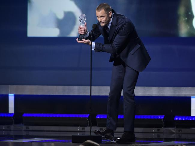 Alexander Skarsgard accepts the award for best supporting actor in a movie made for tv or limited series for “Big Little Lies” at the 23rd annual Critics’ Choice Awards. Picture: AP
