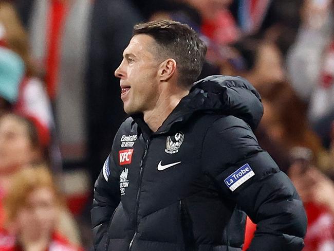 SYDNEY, AUSTRALIA - AUGUST 09: Craig McRae, Senior Coach of the Magpies looks dejected after a loss during the 2024 AFL Round 22 match between the Sydney Swans and the Collingwood Magpies at The Sydney Cricket Ground on August 09, 2024 in Sydney, Australia. (Photo by Michael Willson/AFL Photos via Getty Images)