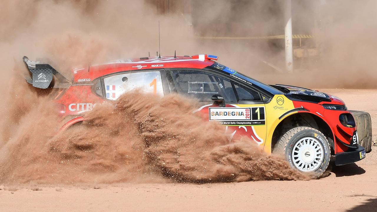 French driver Sebastien Ogier competing in the Rally of Sardinia on June 13. Spectators probably collected a lot of dirt in their ear wax that day. Picture: AFP