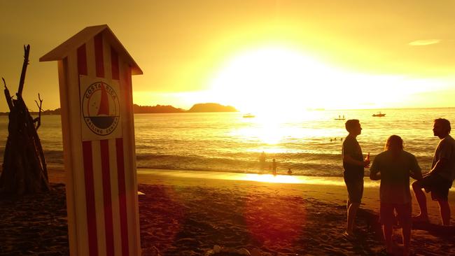 Beers at sunset on Playa Potrero beach in Costa Rica, which is said to be the happiest place on earth. Picture: Gary Burchett