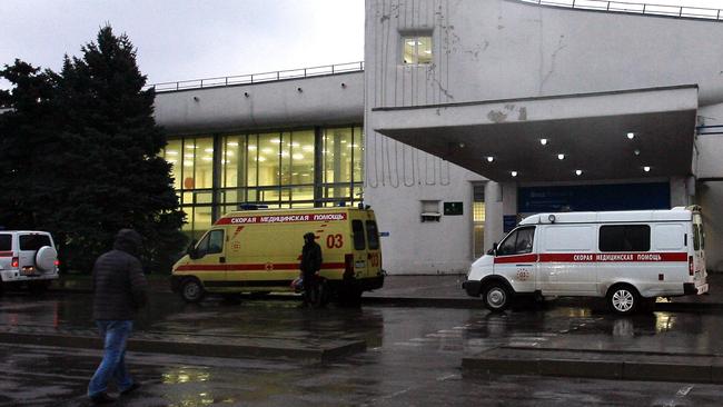 Ambulance cars are parked near the airport building in the city of Rostov-on-Don close to the site of the crash. Picture: AP.