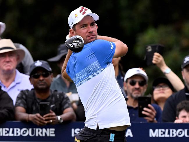 Lucas Herbert of Australia tees off during the third round of the 2024 ISPS Handa Australian Open Golf tournament at the Kingston Heath Golf Club in Melbourne on November 30, 2024. (Photo by William WEST / AFP) / --IMAGE RESTRICTED TO EDITORIAL USE - STRICTLY NO COMMERCIAL USE--