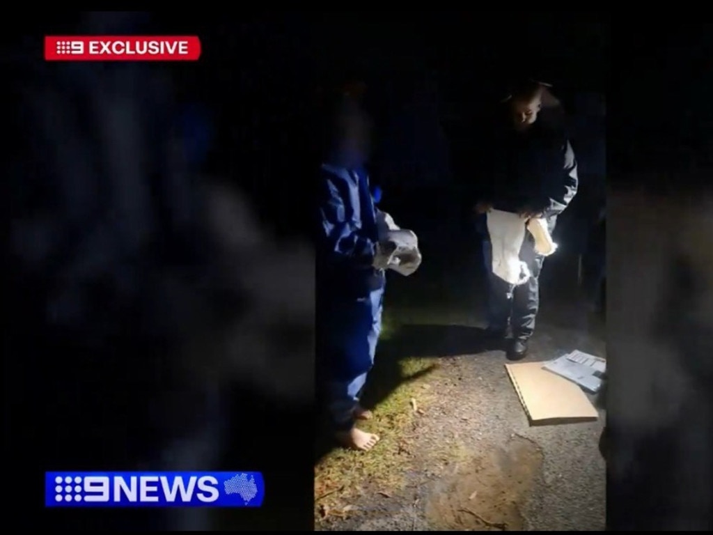 The teen with the forensics team on Saturday night. Photo: 9NEWS