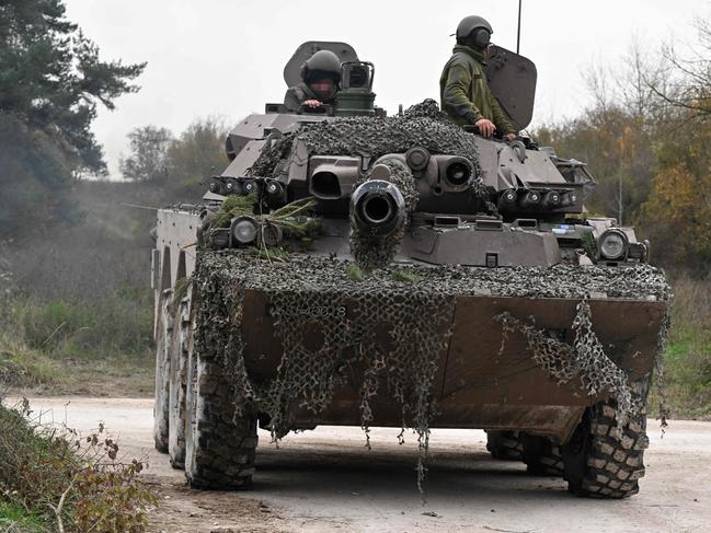 Ukrainian soldiers train in an AMX-10 French armoured fighting vehicle on Thursday. Picture: AFP.