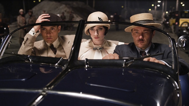 Tobey Maguire, Elizabeth Debicki, and Joel Edgerton in The Great Gatsby. 