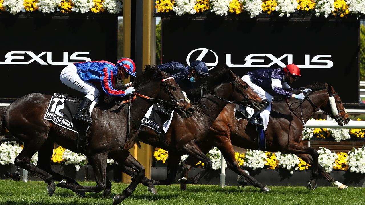 Jye McNeil riding Twilight Payment wins the Melbourne Cup from Tiger Moth.