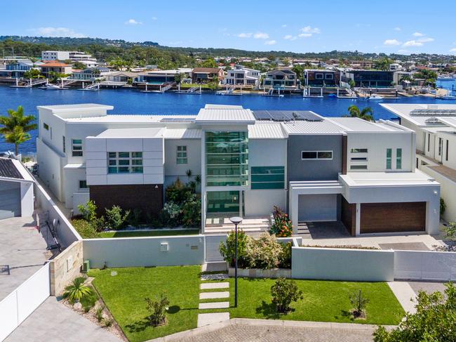 The six-bedroom, six-bathroom home at 13 Mooloolah Island, Minyama has sold for a record price for the island.