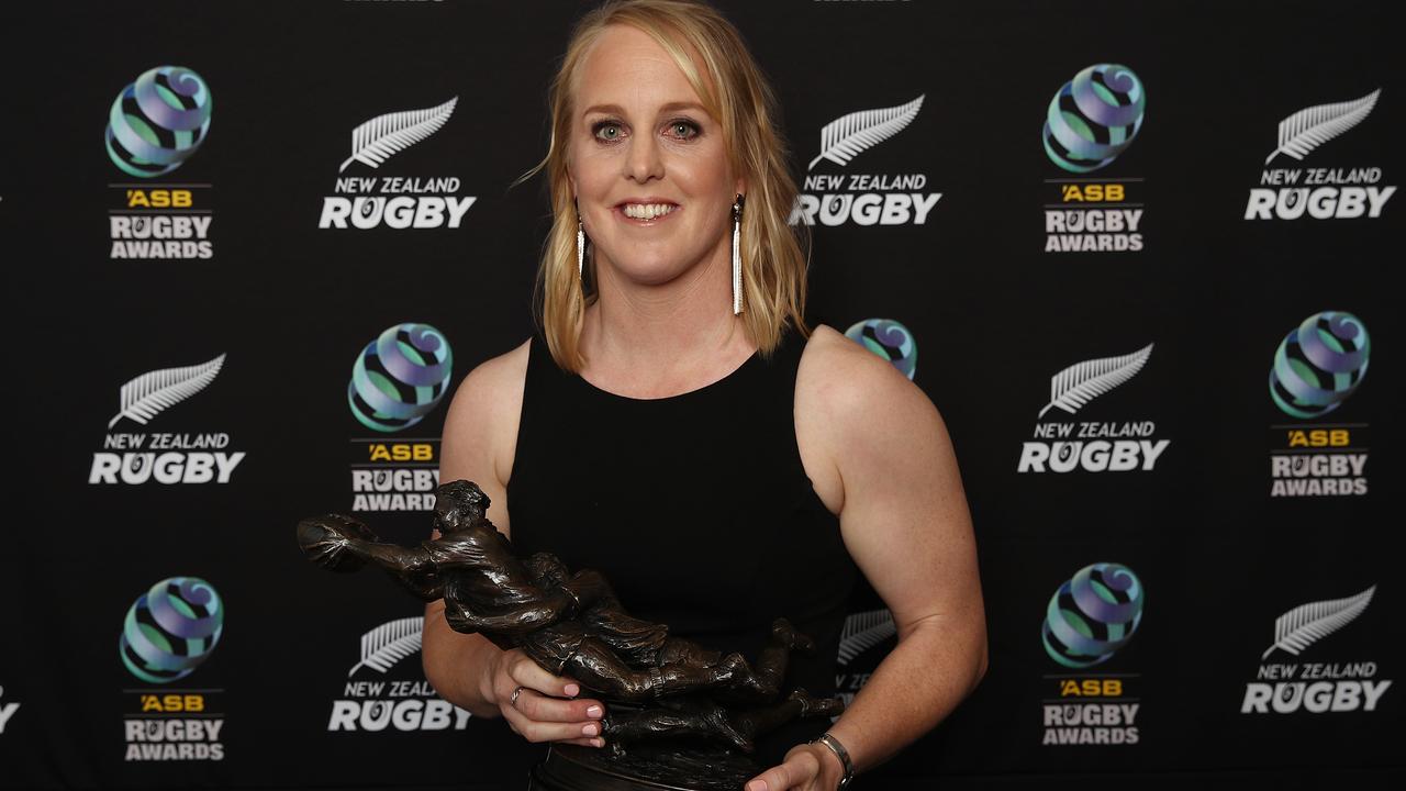 Kendra Cocksedge holds the Kelvin R Tremain Memorial Player of the Year Award.