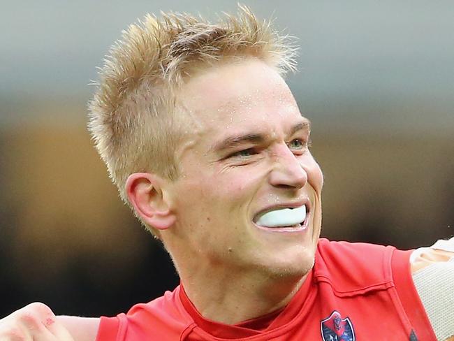 MELBOURNE, AUSTRALIA - MAY 17: Bernie Vince of the Demons celebrates after kicking a goal during the round nine AFL match between the Richmond Tigers and the Melbourne Demons at Melbourne Cricket Ground on May 17, 2014 in Melbourne, Australia. (Photo by Scott Barbour/Getty Images)