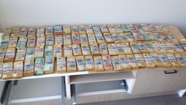 $1.5 million cash seized from a “safe house” Bertucci purchased with a fake alias. Picture: AFP