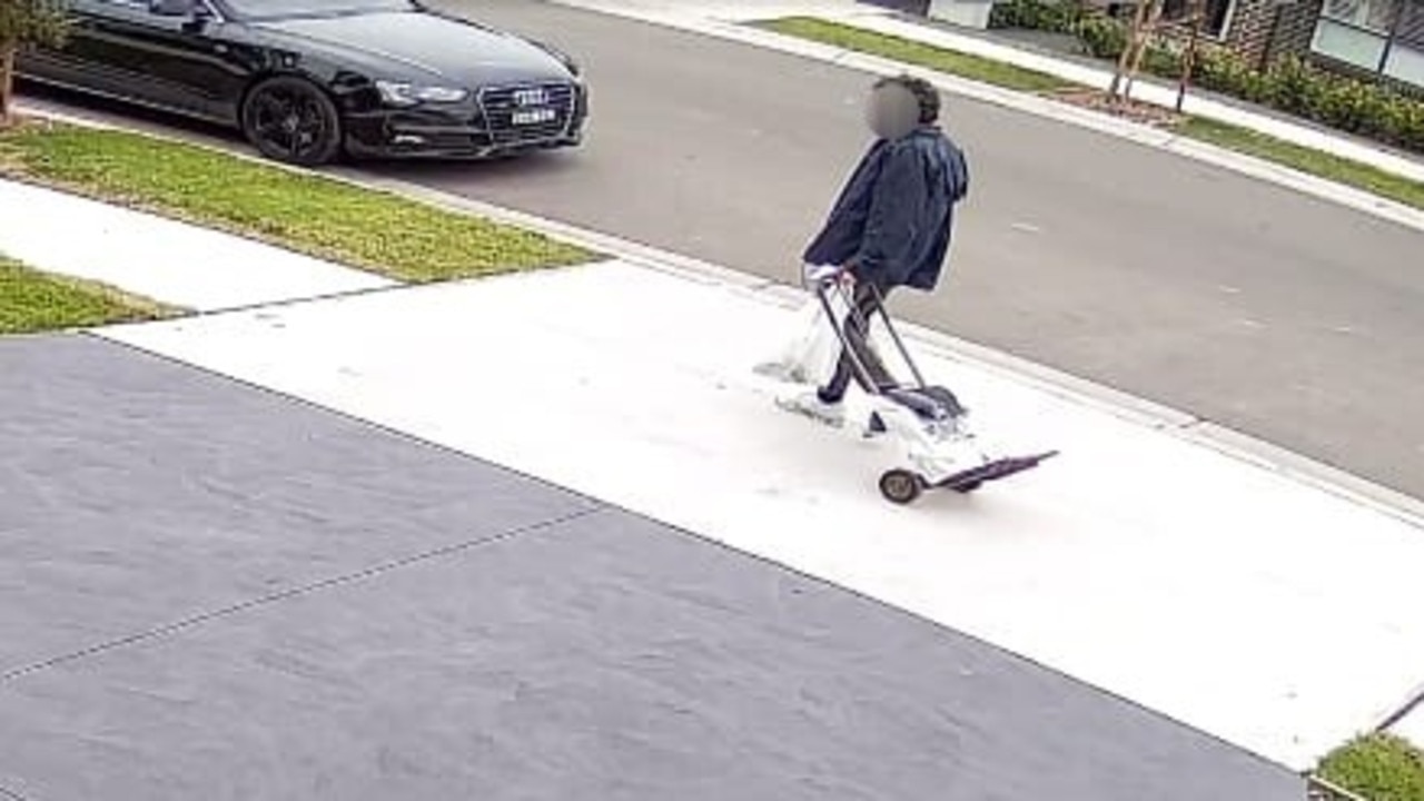 CCTV vision captured the man putting the suspicious package in people's mailboxes on Monday morning.