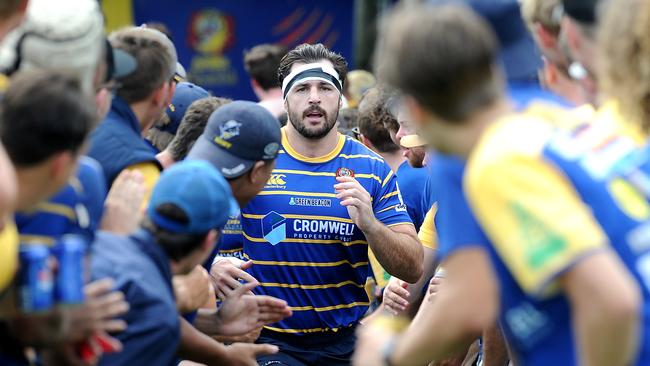 East players Tom Milosevic runs out of the race for the start of the game. Rugby union national championships between Easts and Gordon. Saturday March 20, 2021. Picture, John Gass