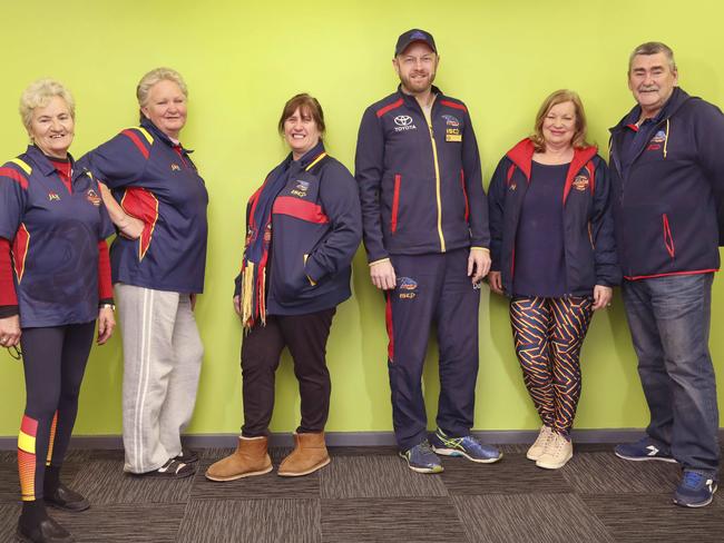 Members of the Crows Supporters Group: Danni Gower, Heather Hill, Julie Elliott, Dylan Clark, Annie Green and Peter Kauschke. Picture: DEAN MARTIN
