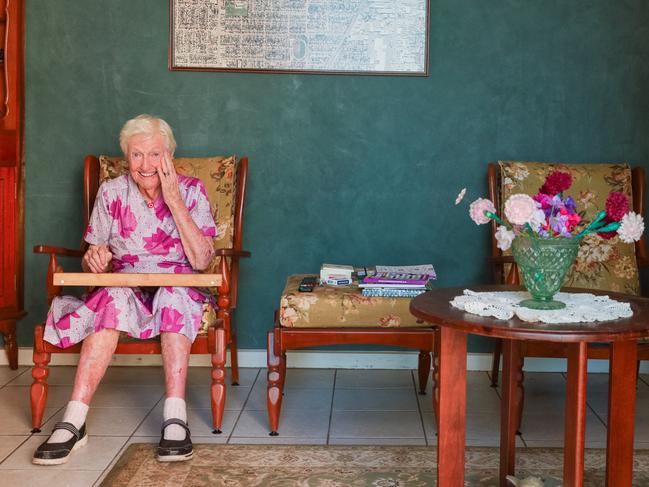 Doreen Creek playing double pack patience on her cards tray while sitting in her living room where the intruder entered and left with her handbag. Picture: Glenn Campbell