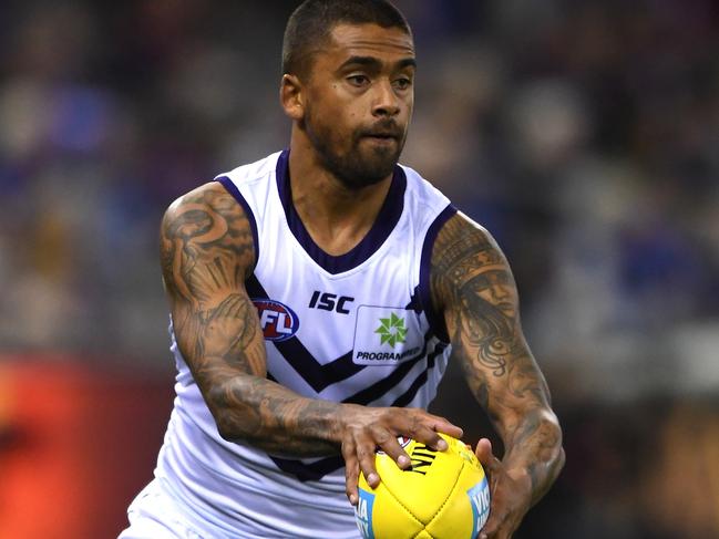 Bradley Hill of the Dockers is seen in action during the Round 19 AFL match between the Western Bulldogs and the Fremantle Dockers at Marvel Stadium in Melbourne, Sunday, July 28, 2019.  (AAP Image/Julian Smith) NO ARCHIVING, EDITORIAL USE ONLY