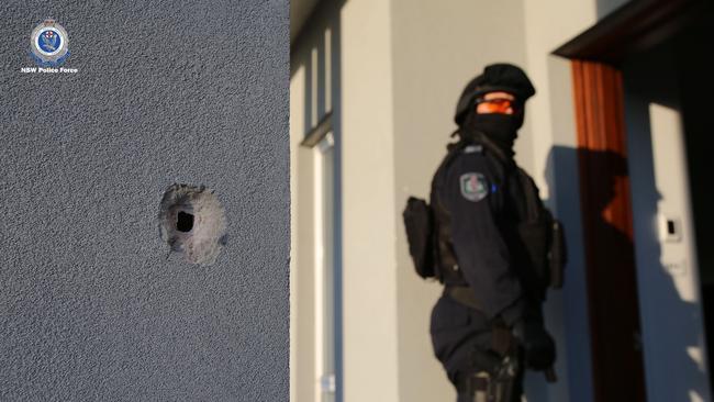 Police were told two masked men ran toward the home and fired a number of shots at the male resident as he arrived home. He was not injured. The men fled the scene in a stolen black Mercedes A45 coupe, which was located on fire just before 3pm on Friend Street, Merrylands. Picture: NSW Police