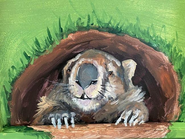 A wombat playing hide-and-seek in the mural painted by local Mackay artist Catherine Clark Dowden.