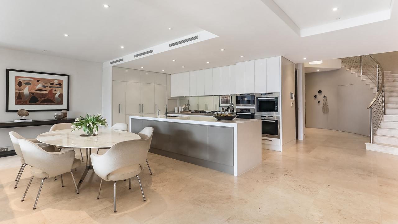 The kitchen has Caesarstone and stainless steel benchtops.