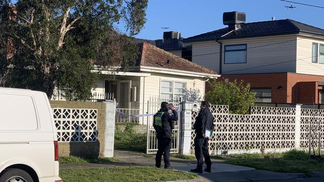 Police at the scene in Noble Park where a man was found critically injured and later died.