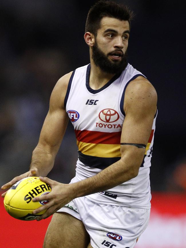 Adelaide Crows Wayne Milera runs with the ball against Carlton at Etihad Stadium. Picture: Daniel Pockett/AAP