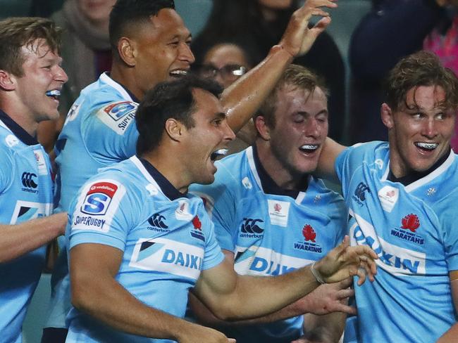 Waratahs players celebrate a try during the Round 14 Super Rugby match between the NSW Waratahs and the Highlanders at Allianz Stadium in Sydney, Saturday, May 19, 2018. (AAP Image/Daniel Munoz) NO ARCHIVING, EDITORIAL USE ONLY