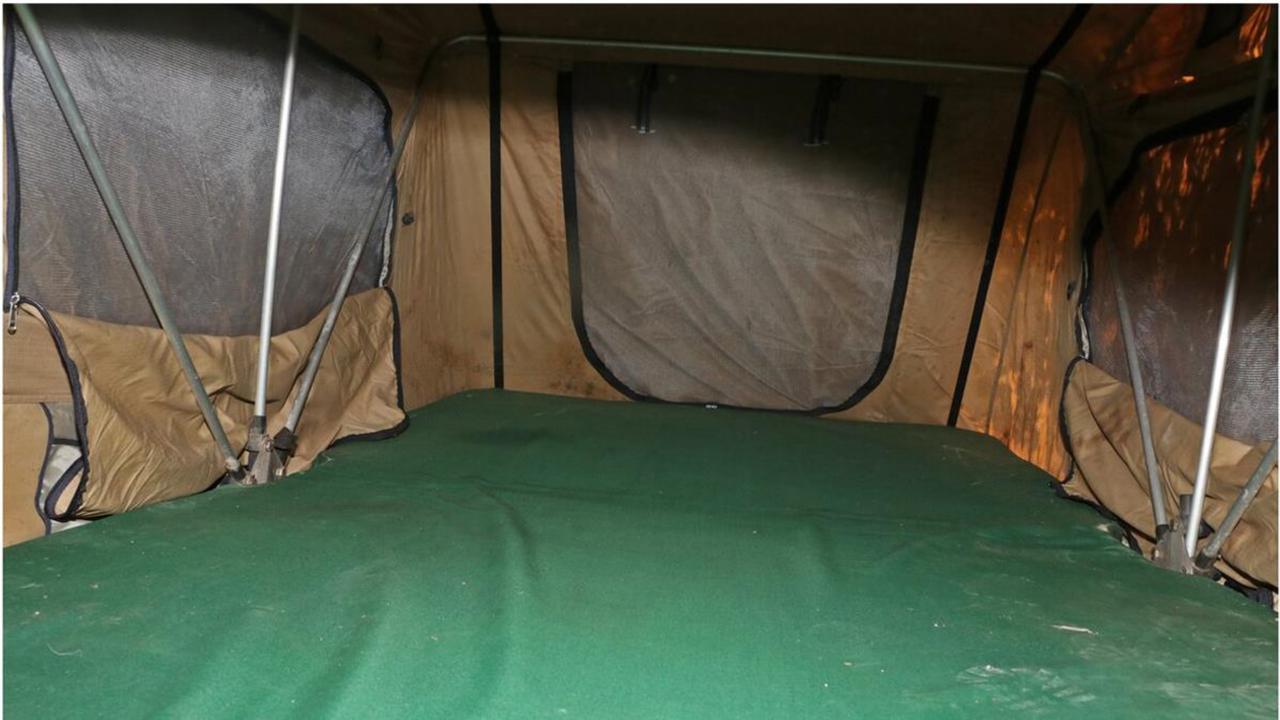 A tent set up at one of the sniper hides at the Train property.