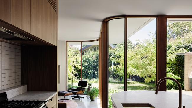 The kitchen and living spaces within Waterfall House in Glen Iris. Picture: Tess Kelly