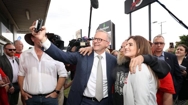 Federal Labor leader Anthony Albanese pictured in Brisbane electorate of Dixon to check in with Labor candidate Ali France and other volunteers. Anthony takes a selfie with local man and Ali. Picture: Sam Ruttyn