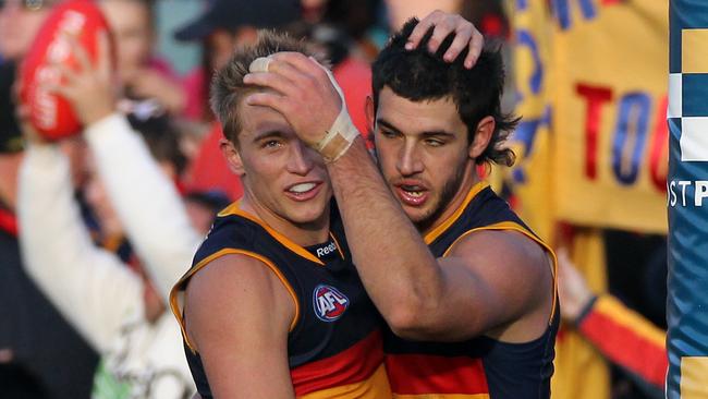 Bernie Vince and Taylor Walker while they were teammates at the Crows. Picture: Simon Cross