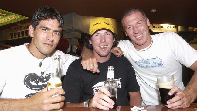 Rohan Kena, Ashley and Jeremy Regan celebrate New Year’s Eve at Mooloolaba in 2003. Picture: Barry Leddicoat.