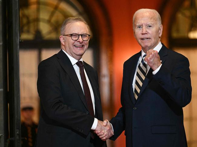 US President Joe Biden bids farewell to Australian Prime Minister Anthony Albanese at the end of the Quadrilateral Summit at the Archmere Academy in Wilmington, Delaware, on September 21, 2024. (Photo by Brendan SMIALOWSKI / AFP)