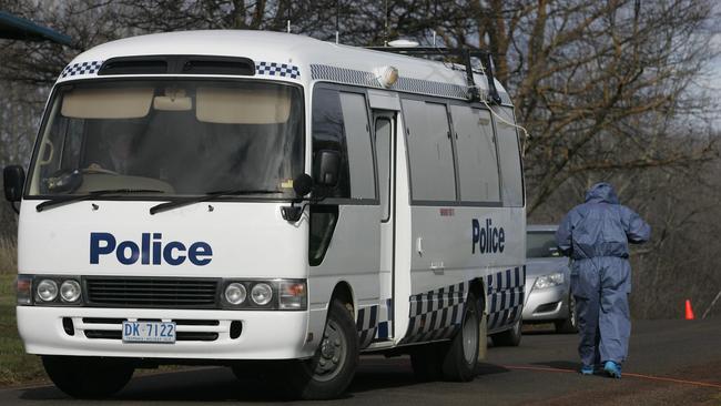 Shane Geoffrey Barker’s body was found at his Campbell Town home in August 2009. Tasmania Police forensic officers at the crime scene.