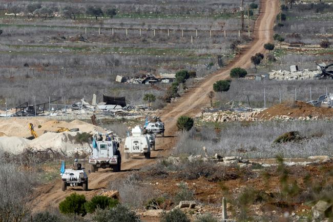 A convoy of United Nations Interim Force in Lebanon (UNIFIL) drives near the southern Lebanese village of Blida, on February 17, 2025