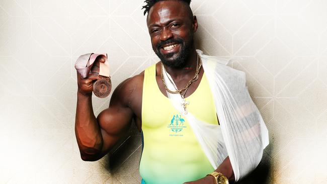 Australian weightlifter Francois Etoundi with his bronze medal after The Gold Coast Commonwealth Games. Picture: Nigel Hallett