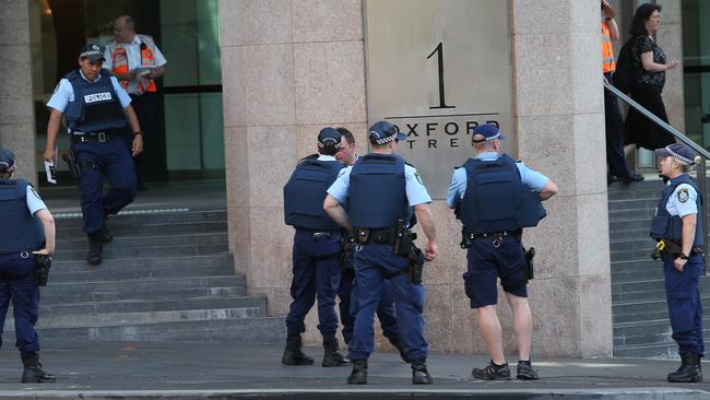 Police attend a possible gunman situation at a building on the corner of Oxford Street and Wentworth Avenue in Sydney. Picture: Richard Dobson