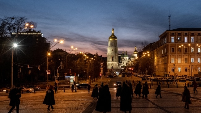 People walk in front of Saint Sophia Cathedral on Friday in Kyiv, Ukraine. Picture: Chris McGrath/Getty Images
