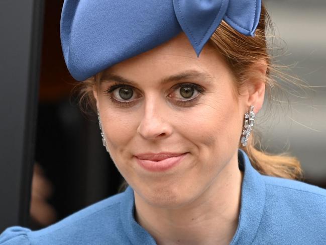 Britain's Princess Beatrice of York arrives to attend the National Service of Thanksgiving for The Queen's reign at Saint Paul's Cathedral in London on June 3, 2022 as part of Queen Elizabeth II's platinum jubilee celebrations. - Queen Elizabeth II kicked off the first of four days of celebrations marking her record-breaking 70 years on the throne, to cheering crowds of tens of thousands of people. But the 96-year-old sovereign's appearance at the Platinum Jubilee -- a milestone never previously reached by a British monarch -- took its toll, forcing her to pull out of a planned church service. (Photo by Daniel LEAL / POOL / AFP)