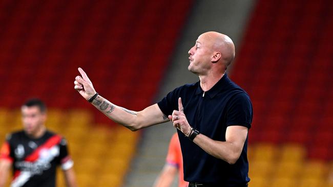 Roar coach Ruben Zadkovich instructs his players during Brisbane’s 4-1 loss to Melbourne City. Picture: Bradley Kanaris/Getty Images