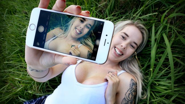 Twenty-one-year-old Jemma Brown had breast implants so she feels better about herself on social media. The social media boom has been responsible for a cosmetic surgery boom. (Pic: Tara Croser)