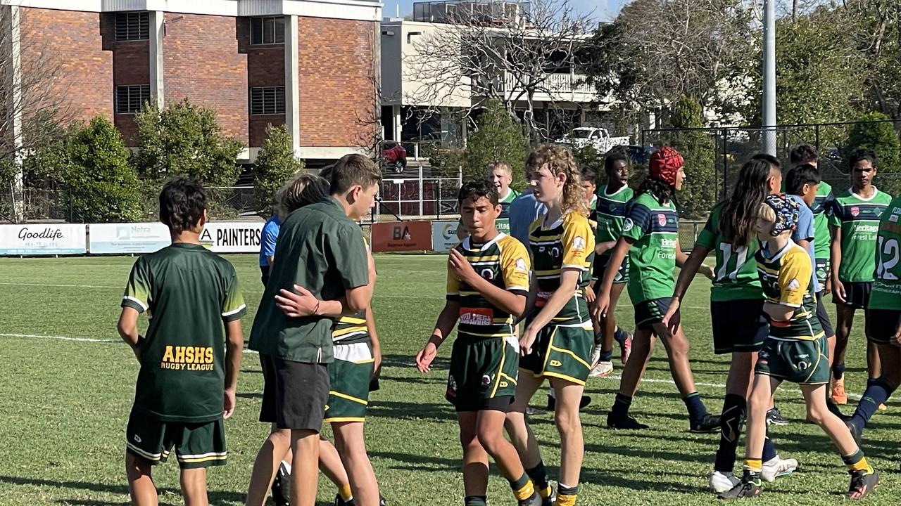 The Year 7 grand final between Alexandra Hills and Forest Lake SHS - players shake hands each other.