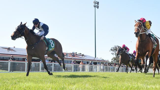 Roguery (left, ridden by Matthew Cartwright) wins at Kilmore ahead of his Derby tilt. Picture: Pat Scala / Racing Photos