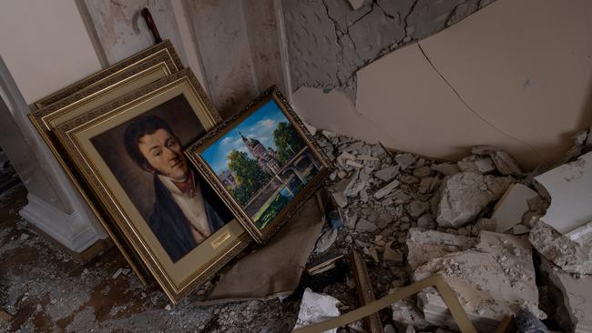 Paintings are seen salvaged from the debris at the destroyed Kharkiv Regional State Administration building.