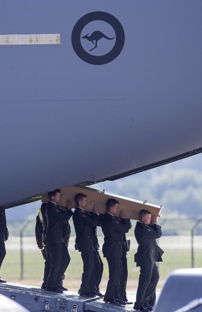 Bodies are carried from The RAAF C-17. Picture: Supplied