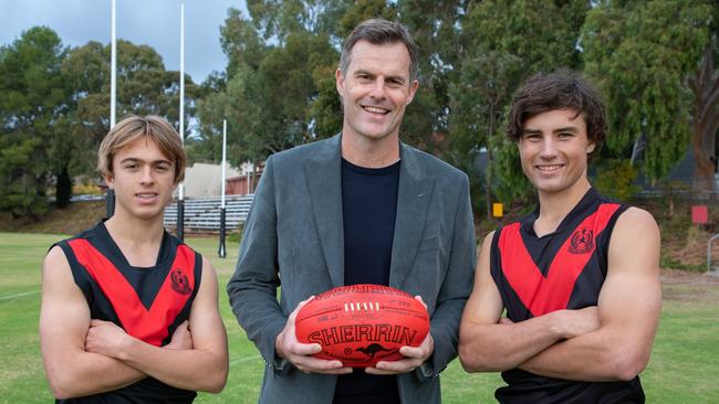 Rostrevor First XVIII vice-captain Tyson Walls (L), AFL great Luke Darcy and current captain Jayden Gale. Picture: Supplied by Laura Syme