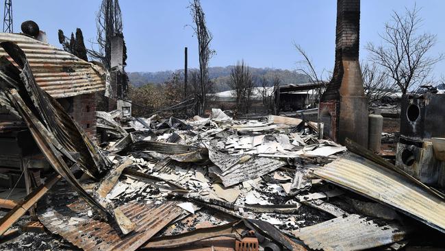 A group of tradies are donating their skills to help re-build bushfire-ravaged communities. Picture: AFP