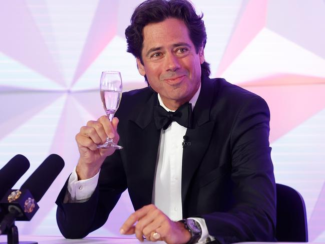 GOLD COAST, AUSTRALIA - OCTOBER 18: Gillon McLachlan, Chief Executive Officer of the AFL toasts Lachie Neale of the Lions during the 2020 Brownlow Medal Count at Metricon Stadium on October 18, 2020 on the Gold Coast, Australia. (Photo by Michael Willson/AFL Photos via Getty Images)