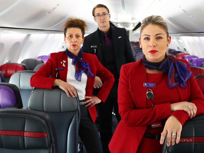 21/04/20 Virgin Australia staff (L-R) Marcella Pirritano, Jason Arends and Jessica Turnbull at Melbourne airport on the day the company announced it has gone into administration due to COVID-19. Aaron Francis/The Australian