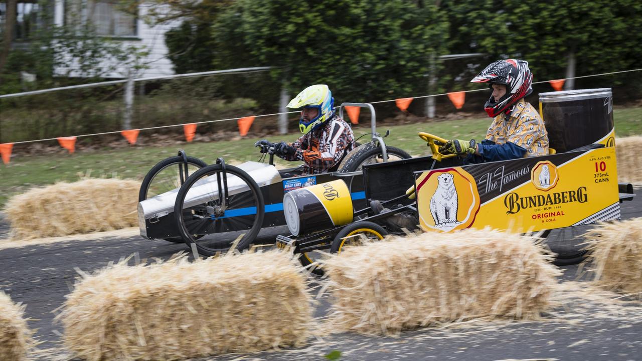 "Madcat" Mick Bradford (left) races against Ben Priebbenow in a senior class of the Greenmount Billy Cart Challenge, Saturday, November 25, 2023. Picture: Kevin Farmer